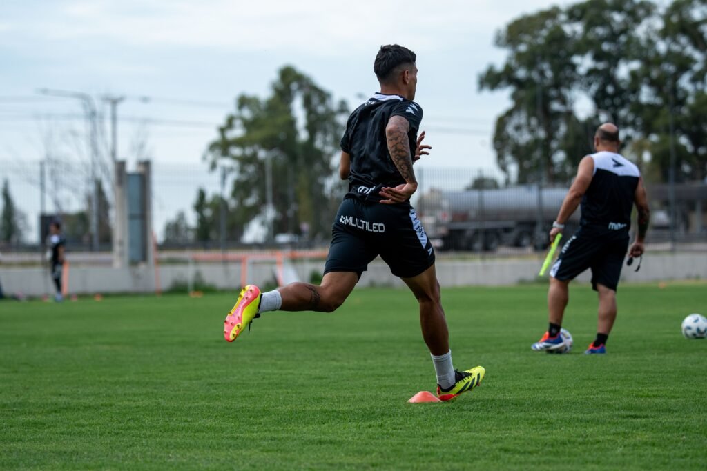 footballer running in training