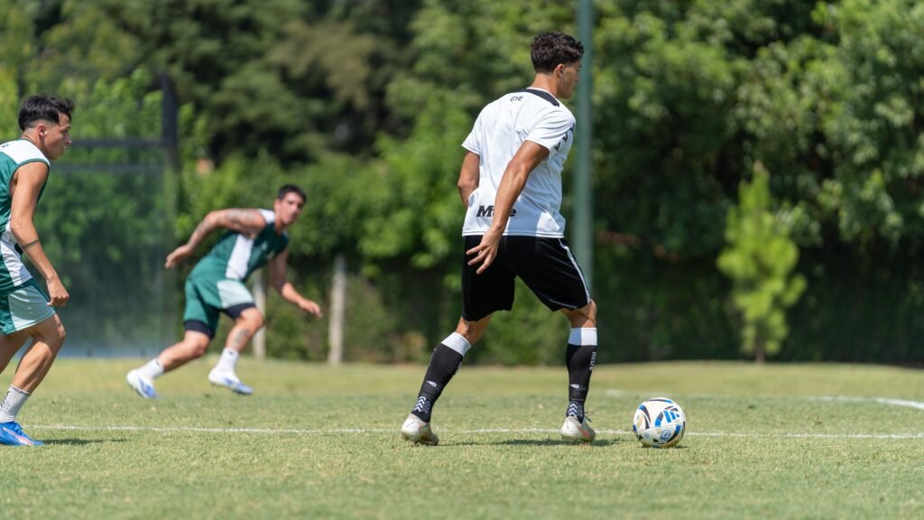 footballer dribbling with a ball