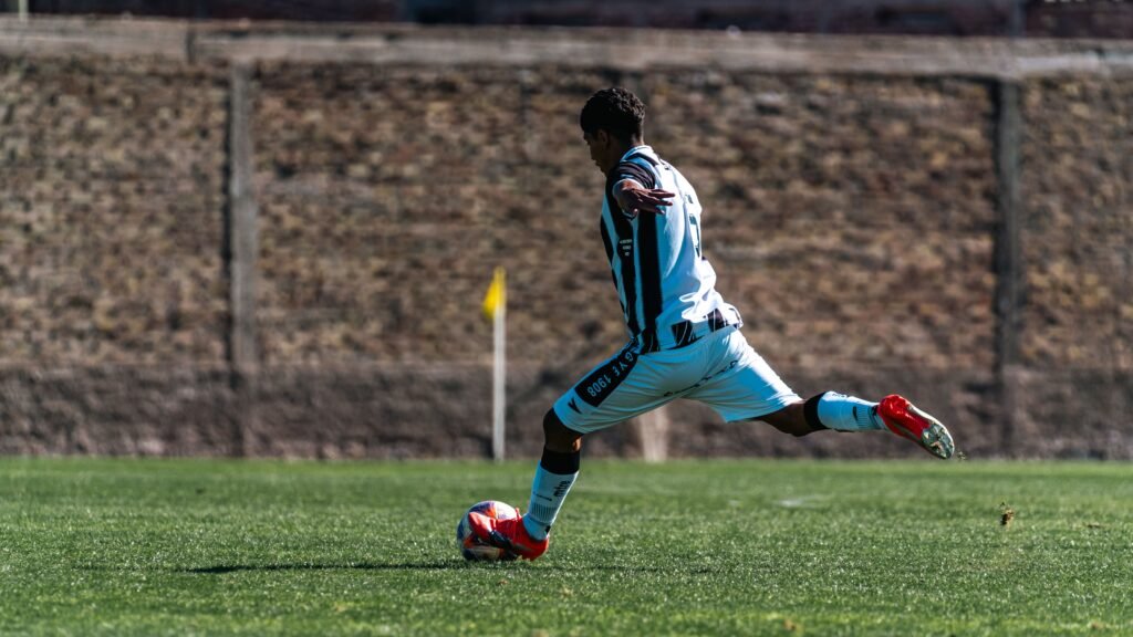 football player taking a shot
