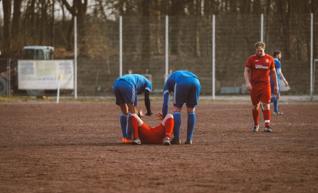 football player injured on the floor